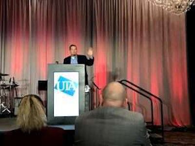 Steve Tam with ACT Research speaks Thursday at the Used Truck Association (UTA) annual convention in Las Vegas.