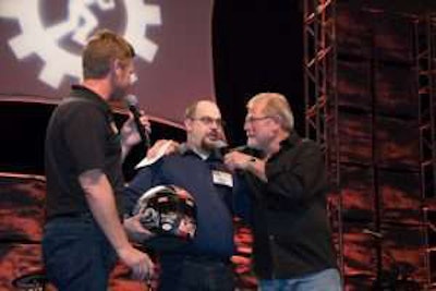 Justin Euler (center) with Rush President, CEO and Chairman Rusty Rush (left) and Rush Truck Centers’ Driver Clint Bowyer after winning the 12th annual Rush Truck Rodeo this week.