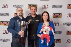 Euler, his wife Erin and son Jackson pose with Bowyer after the competition.