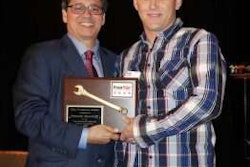 Jerry Kocan, Four Star Freightliner dealer principal (left), presents Kenneth Woodruff with the Technician of the Year award.