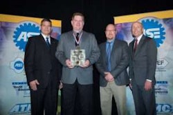 (From left to right) Jeff Walker, chairman of the ASE Board of Directors; Brian Stevens, award winner; Mike Mallett, training programs manager for Freightliner/Western Star; and Tim Zilke, ASE president and CEO