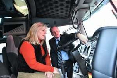SLCC President Deneece G. Huftalin is shown features within a new Kenworth tractor by Kenworth Sales Company President Kyle Treadway during last Thursday’s announcement.