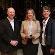 Eganne Wolfington of Wolfington Body Company accepts the 2017 IC Dealer of the Year award. She is flanked from left to right by Ryan Kauffman (vice president of sales, IC Bus) and Trish Reed (general manager and vice president, IC Bus).