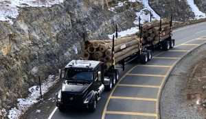 Volvo VNL Hauling Logs