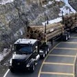 Volvo VNL Hauling Logs