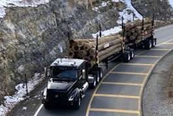 Volvo VNL Hauling Logs