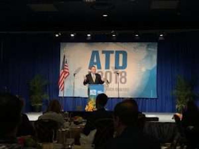 Steve Tam, vice president at ACT Research, presents Saturday at ATD Show 2018 in Las Vegas.