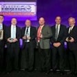 The Thomas Bus Sales of Georgia team poses with awards during the Thomas Built Buses Dealer Meeting in Orlando.