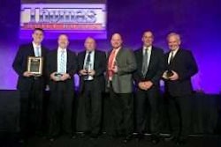 The Thomas Bus Sales of Georgia team poses with awards during the Thomas Built Buses Dealer Meeting in Orlando.
