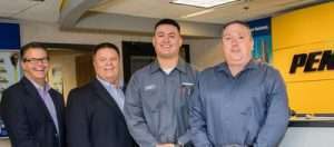 Pictured from left to right are Penske Truck Leasing associates Gregg Mangione, senior vice president of maintenance; Tony Popple, senior director of maintenance; David Barba, technician; John Marvin, district manager.