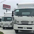 Isuzu commercial trucks parked on lot