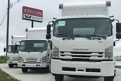 Isuzu commercial trucks parked on lot