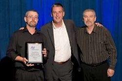 Dean Vicha, NationaLease president (center), presented the Exceptional Service Award to 12 NationaLease members. Shown above are recipients Randy Johnson (right) and Eric Poppe (left), both of Kirk NationaLease.