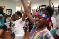 Posing During Rites of Passage Program at Baileys Cafe