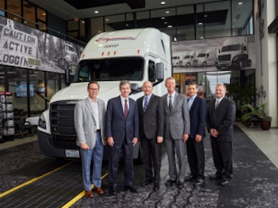 DTNA Senior Vice President of Operations and Specialty Vehicles Jeff Allen (left to right), North Carolina Governor Roy Cooper, DTNA CEO Roger Nielsen, Freightliner Trucks Vice President of Sales Bob Correll, Cleveland Truck Manufacturing Plant Manager Erik Johnson and Chairman of Cargo Transporters John Pope