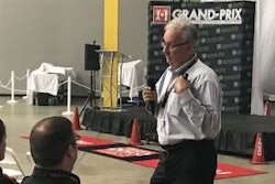 George Arrants, ASE Education Alliance manager for medium/heavy duty trucks, presents Wednesday at the Isuzu North American technician competition.