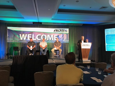 Paul Thoms speaks Thursday at the ADS Convention. Fellow panelists (from left) Curtis Owens, Mike Perkins and Al Roberts.