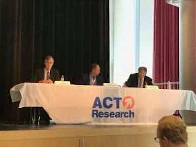 From left: ACT Research’s Jim Meil, Bryan Bezold of Ford Motor Company and ACT Research’s Sam Kahan spoke on the U.S. economy during Tuesday’s event.