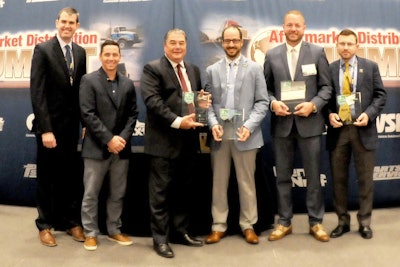 From left: Truck Parts & Service Editor Lucas Deal, GenNext President Nick Seidel present the first 4 Under 40 Awards to Don Reimondo (accepting for Nikki Paschall), Ian Johnston, Steve Hansen, Nick Tosie. Photo courtesy of Gene Ho.