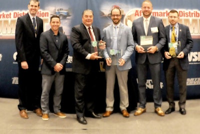 From left: Truck Parts & Service Editor Lucas Deal and GenNext President Nick Seidel present the first 4 Under 40 Awards to Don Reimondo (accepting for Nikki Paschall), Ian Johnston, Steve Hansen and Nick Tosie. Photo courtesy Gene Ho.
