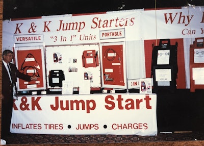 K & K Jump Starters man with display sign