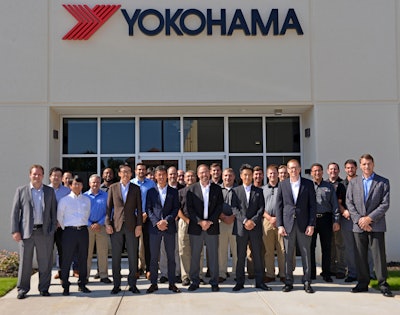 Shinichi Takimoto, president and CEO, Yokohama Tire Corp. of North America (YCNA), and chairman and CEO at YTC (front, fourth from left), joined YDCA employees for the opening, including Tetsuya Kuze, executive vice president at YCNA (third from left) and Shoichiro Matsuda, YCNA vice president of corporate technical (sixth from left).