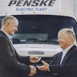 Daimler Trucks North America CEO Roger Nielsen delivers the first Freightliner eM2 electric commercial vehicle to Penske Truck Leasing CEO Brian Hard. The eM2 is the first of the Freightliner Electric Innovation Fleet that Penske will use in California and the Pacific Northwest.