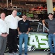 Barry Wilson (left to right) and Lance Eskridge of TruNorth, NASCAR driver Ross Chastian, Paul Teutul Jr. of Paul Jr. Designs and NASCAR driver Reid Wilson
