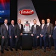 Leon Handt, Peterbilt assistant general manager, operations (left to right); Peyton Harrell, Peterbilt director of dealer development; John Arscott, Greg Arscott, and Jeff Arscott, The Peterbilt Store; Jason Skoog, Peterbilt general manager; and Robert Woodall, Peterbilt assistant general manager, sales and marketing