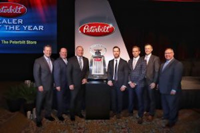 Leon Handt, Peterbilt assistant general manager, operations (left to right); Peyton Harrell, Peterbilt director of dealer development; John Arscott, Greg Arscott, and Jeff Arscott, The Peterbilt Store; Jason Skoog, Peterbilt general manager; and Robert Woodall, Peterbilt assistant general manager, sales and marketing