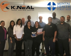 K. Neal’s management team after completing the Mental Health First Aid Certification Training.