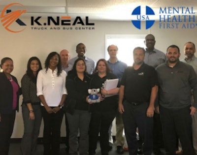 K. Neal’s management team after completing the Mental Health First Aid Certification Training.
