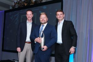 Ken Roemer, Paccar Leasing president (from left); Jim Callaway, PacLease Edmonton Kenworth general manager; and Jake Civitts, Paccar Leasing director of franchise operations