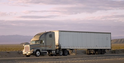 Truck Driving Down The Road