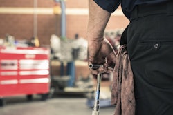 technician with wrench
