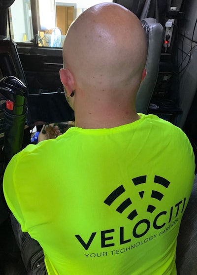 Velociti tech installing Platform Science connectivity device