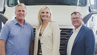 U.S. Rep. Kevin McCarthy (left) meets with Kim Mesfin, Affinity Truck Center president, and Roy Peters, general manager at the dealership.