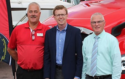 U.S. Rep. Dusty Johnson (center) meets with Dutch Van Santen (left), manager at I-State Truck Center in Sioux Falls, S.D., and Myron Rau (right), president of the South Dakota Trucking Association, during a dealership visit.