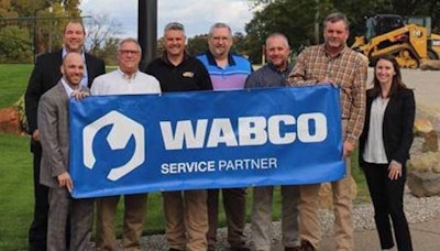 The WABCO and Michigan CAT teams celebrate the launch of the service partner program at Michigan CAT’s Novi facility.
