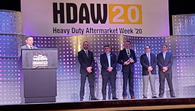 Nick Seidel, vice president, Action Truck Parts, receives the 2019 Distributor of the Year Award at Heavy Duty Aftermarket Week (HDAW) in Grapevine, Texas.