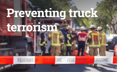 preventing truck terrorism, firefighters huddled behind caution tape