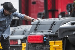 Stock-image-customer-inpsecting-truck-700×400-min