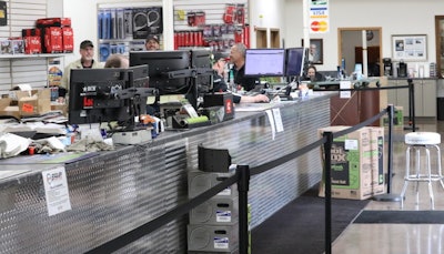 Sadler Power Train has placed barriers in front of its parts counter to maintain safe social distances between employees and customers.