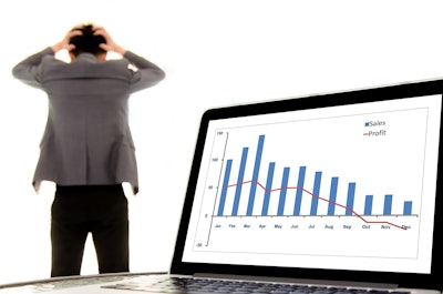 Lead Art Of Businessman Looking At Sales Chart On Laptop