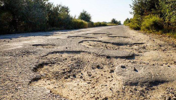 06.20.Old road broken damaged highway