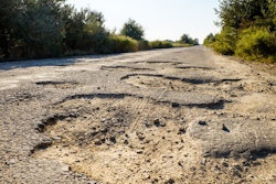 06.20.Old road broken damaged highway