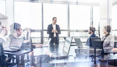 sales manager in team meeting