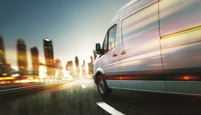 07.20.Commercial delivery transit van on road