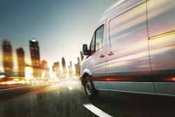 07.20.Commercial delivery transit van on road