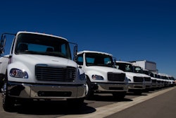 07.20.Medium-duty trucks on lot outside